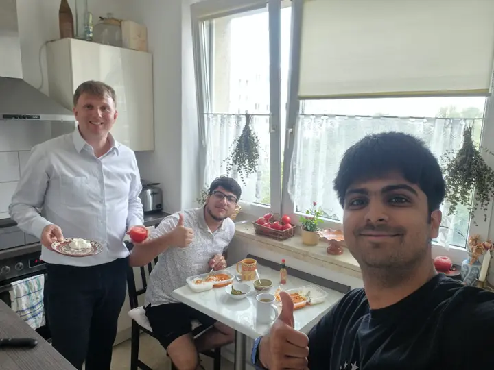 Arnav, Saksham, and Mario sharing a meal