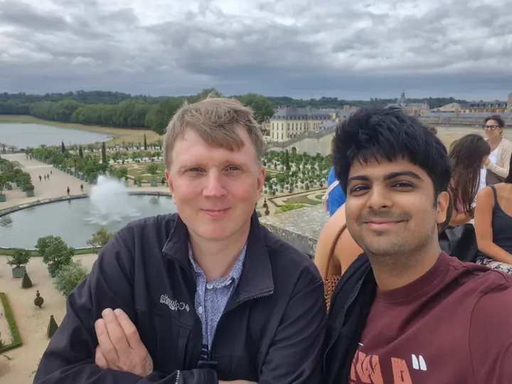 Arnav and Mario at the Palace of Versailles gardens
