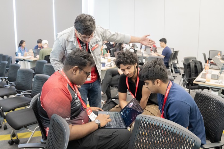 Arnav, Saksham, Srivatsav, and Vedansh working during the FOSSASIA hackathon